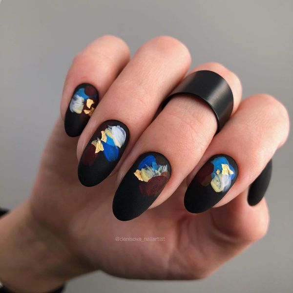girls black nail art design with matte finish