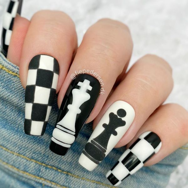 white and black checkered nail design