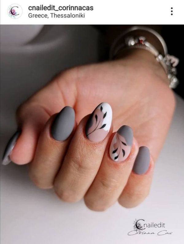 white and gray nails with leaves