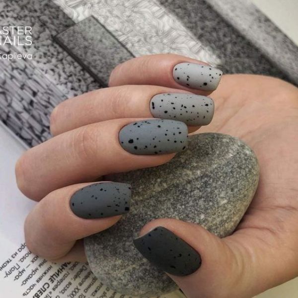 gray nail design with egg pattern