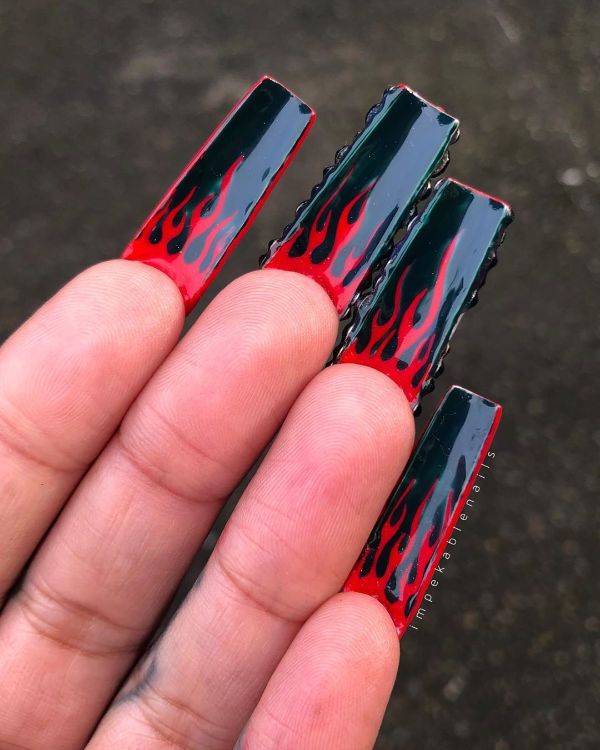 black nails with red underneath