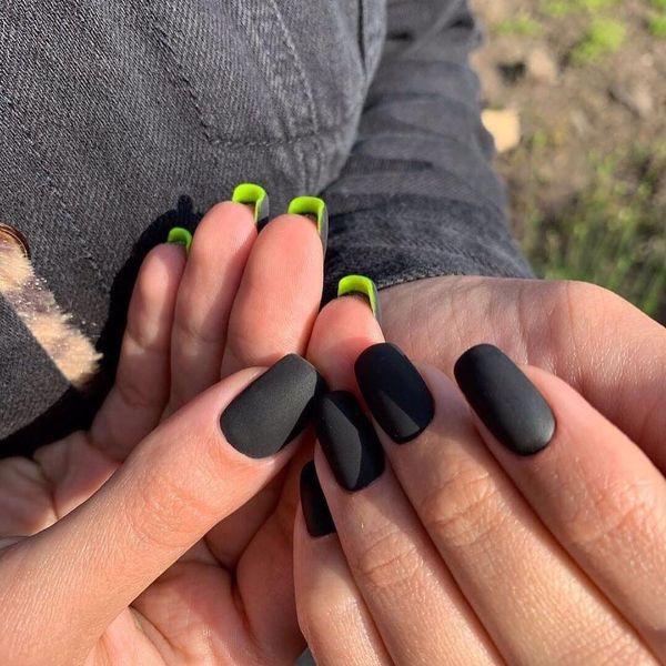 matte black nails with green underneath