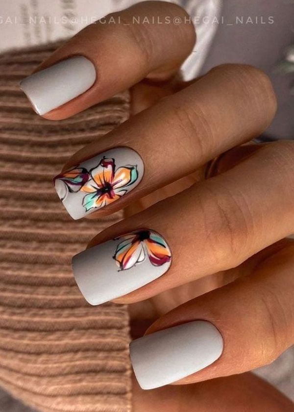 light gray nails with flowers