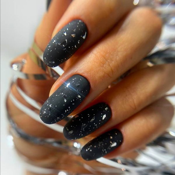 very dark gray nails with glass design