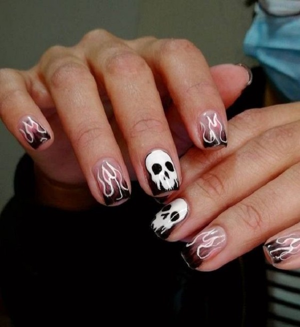 male nails with skulls