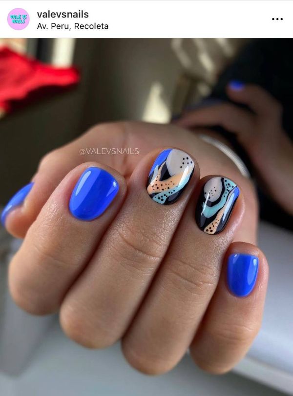 blue nails with abstract desing