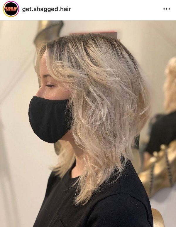 wolf haircut blonde and dark roots