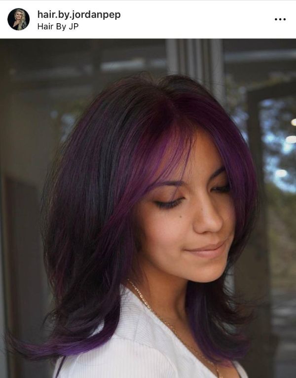 wolf haircut purple highlights
