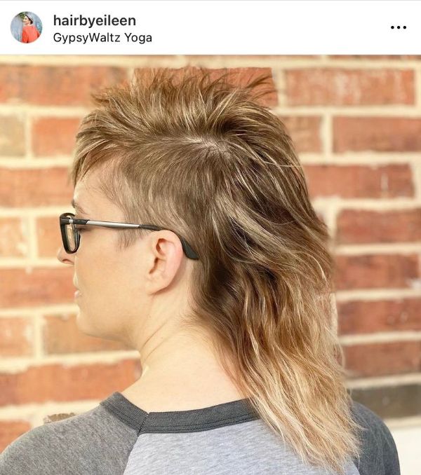 androgynous non-binary wolf haircut with undercut