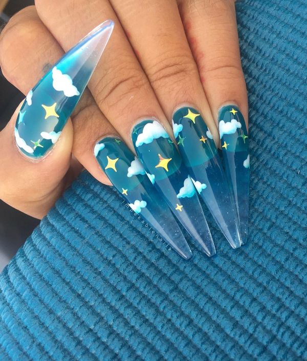 long clear blue nails with clouds