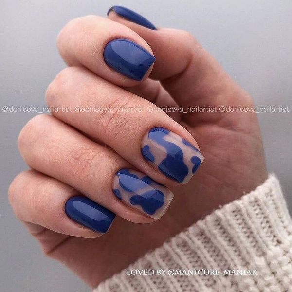 deep blue nail art with blue spots