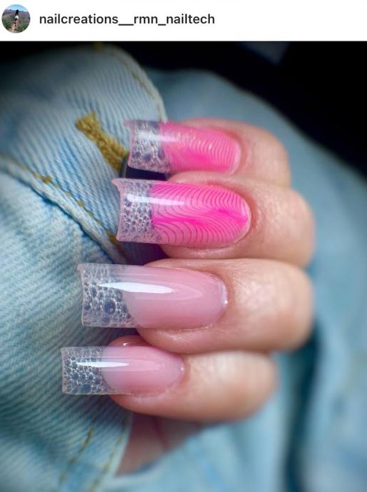 French glass nails with pink graphic design