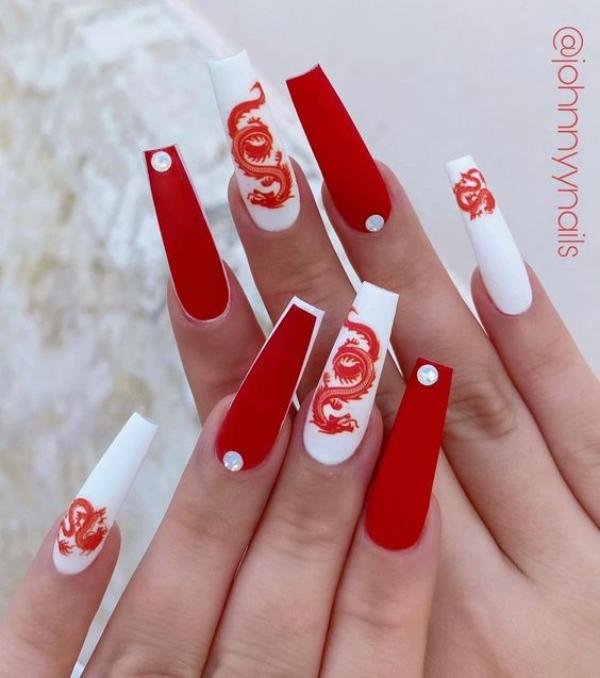 white and red dragon nails