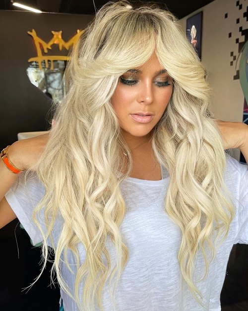 sexy long blonde hairstyle with curtain bangs