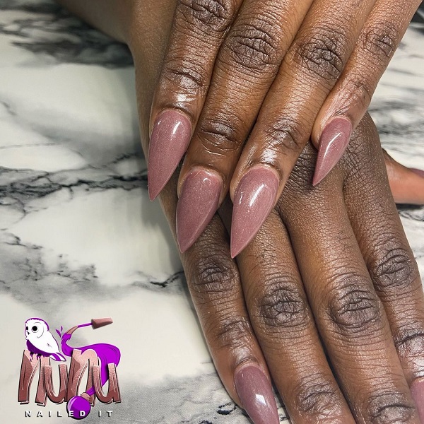 purple-pink shimmering nail polish for dark skin tones