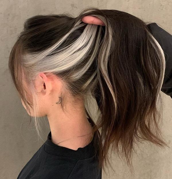 skunk stripe alternative haircut blonde underneath