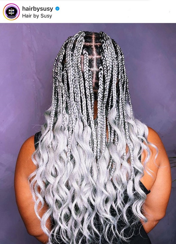 gray square parted box braids with curly ends