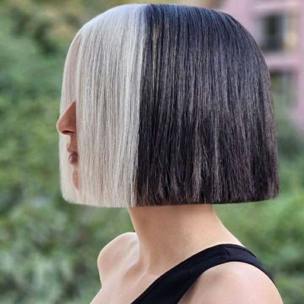 short center-parted bob with white front strands