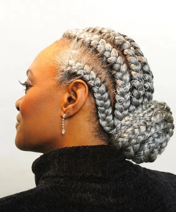thick gray cornrows with low bun