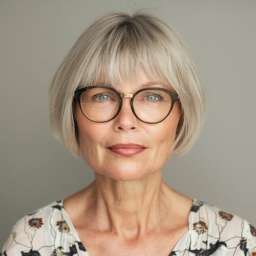 senior woman glasses very short bob cut