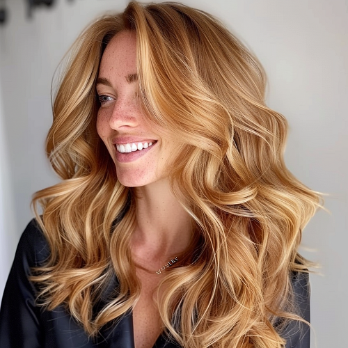 long wavy honey blonde hair with caramel