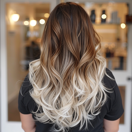 Chocolate brown hair with platinum ombre highlights on the ends