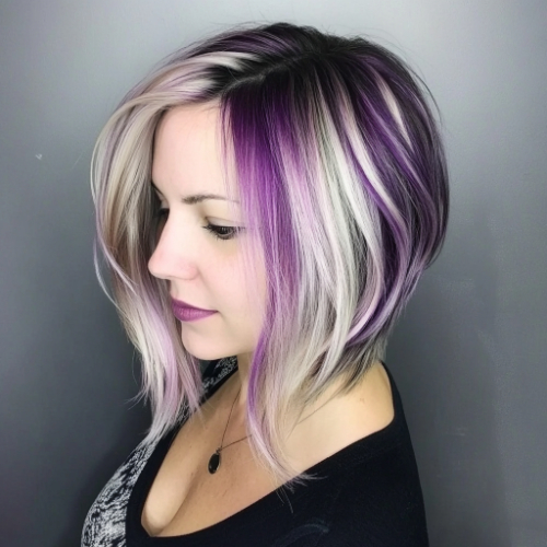 Vibrant purple bob hairstyle with a sleek, modern cut