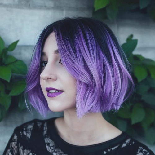 Eye-catching purple bob hairstyle with a sleek and polished finish