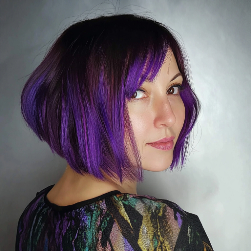 Stylish purple bob hairstyle featuring a contemporary, trendy cut