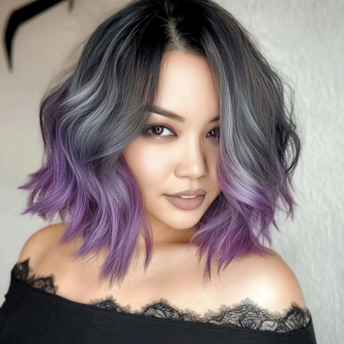 Contemporary purple bob hairstyle with textured layers and flair