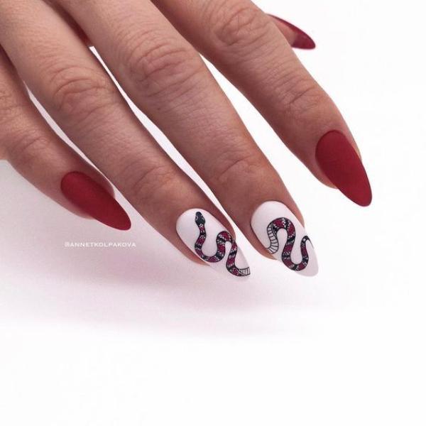 red-and-white-nails-with-a-red-snake