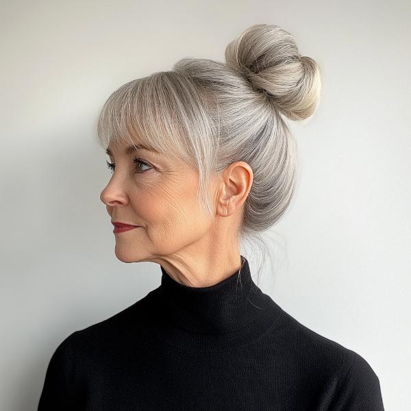 older woman bun with straight-across full bangs