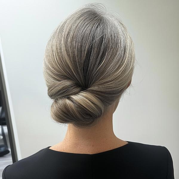 senior woman low twisted chignon bun